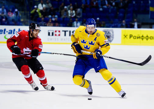 Thibaut Monnet, Schweiz, försöker att stoppa Patrik