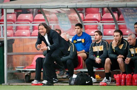 Özcan Melkemichel, tränare