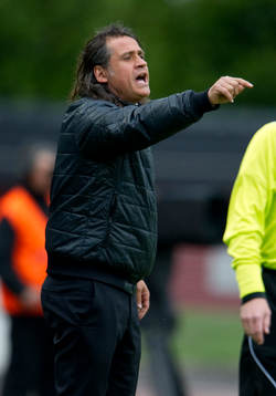 Özcan Melkemichel, tränare