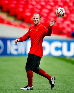Wayne Rooney skrattar
