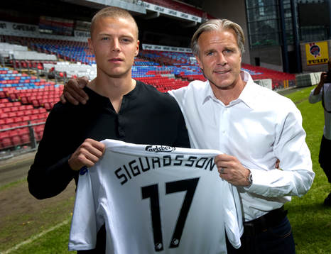 Ragnar Sigurdsson och Roland Nilsson, tränare