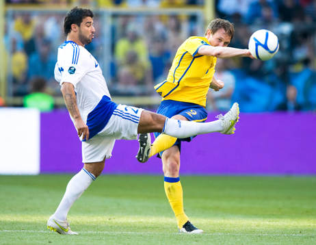 Kim Källström, Sverige, och Alexei Emerenko, Finland
