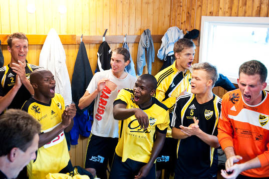 Jubel, glädje, omklädningsrum, segerdans