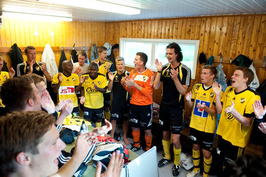 Jubel, glädje, omklädningsrum, segerdans