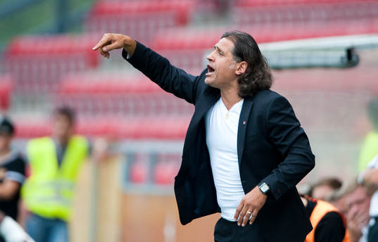 Özcan Melkemichel, tränare