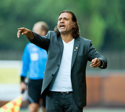 Özcan Melkemichel, tränare