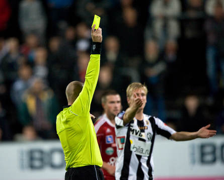 Domare, gult kort, varning