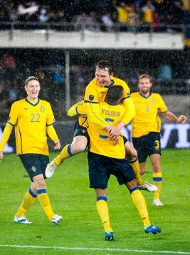Kim Källström jubel med Martin Olsson