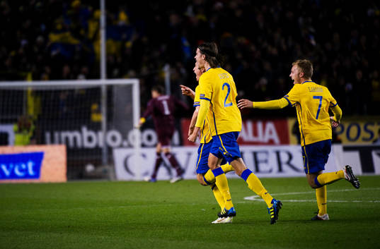 Kim Källström, Mikael Lustig och Sebastian Larsson,