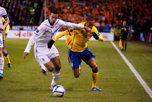 Robin van Persie, Holland och Martin Olsson, Sverige