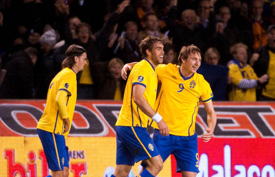 Mikael Lustig, Johan Elmander och Kim Källström, Sverige