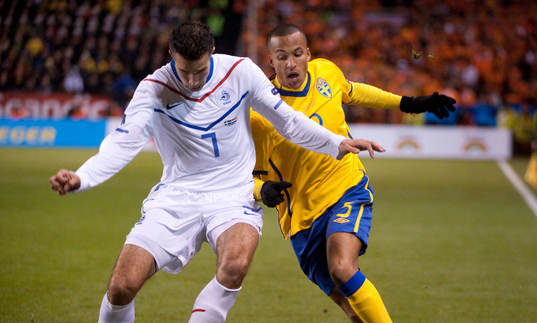 Robin van Persie, Holland och Martin Olsson, Sverige
