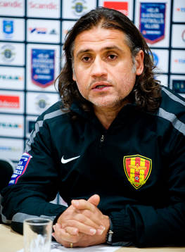 Özcan Melkemichel, tränare