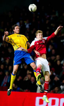 Jonas Olsson, Sverige, Niklas Bendtner, Danmark