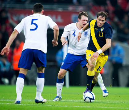 Johan Elmander, Sverige. Phil Jones, England