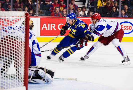 Erik Thorell, Sverige, tar sig förbi Igor Ozhiganov,