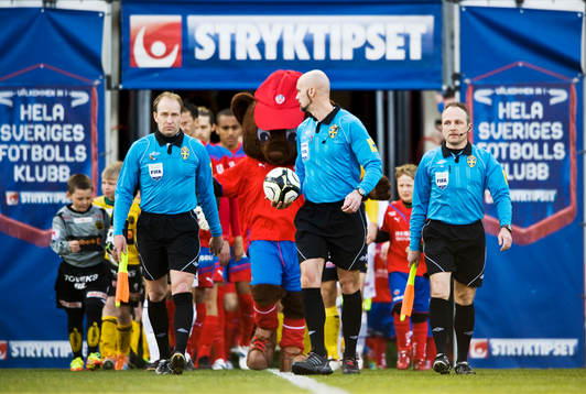 Fredrik Nilsson och Magnus Sjöblom, assisterande domare