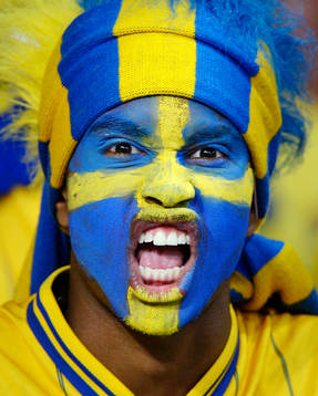 Ett svenskt fan, supporter visar känslor