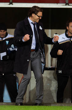 Rikard Norling, tränare Malmö FF jublar vid slutsignal