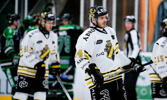 Kris Beech, AIK, deppar när Rögle jublar i bakgrunden