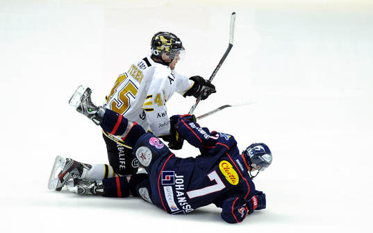 Oscar Steen i AIK och Magnus Johansson LHC