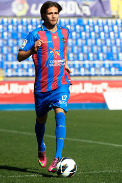 Robert Aquafresca poses with the ball at the new signing of