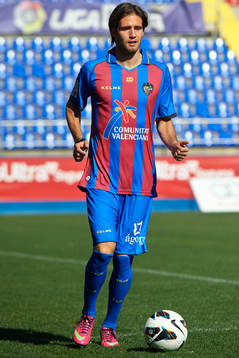 Robert Aquafresca poses with the ball at the new signing of