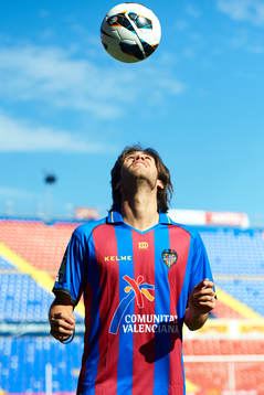 Robert Aquafresca poses with the ball at the new signing of