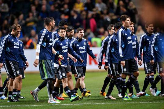 Lionel Messi, i mitten av sitt Argentina när de lämnar