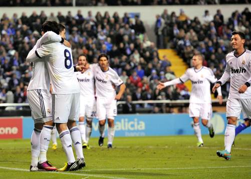 Real Madrid players celebrating victory goal scored by