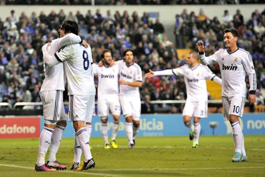 Real Madrid players celebrating victory goal scored by