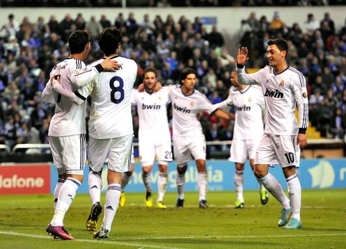 Real Madrid players celebrating victory goal scored by