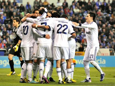 Real Madrid players celebrating victory goal scored by