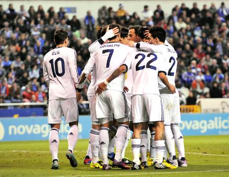 Real Madrid players celebrating victory goal scored by