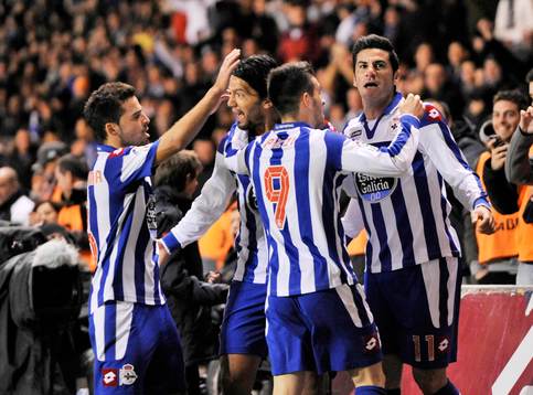 Riki celebrating his goal- with Pizzi, Abel Aguilar and