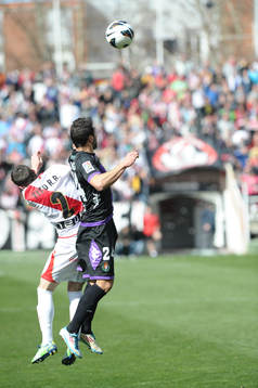 player Rayo Vallecano defense tito (2) with Player Real