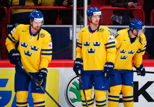 Sveriges Daniel Sedin (v), Henrik Sedin (m) och Alexander