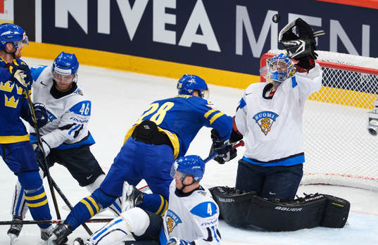 Dick Axelsson, Sverige, Antti Raanta, målvakt, Finland