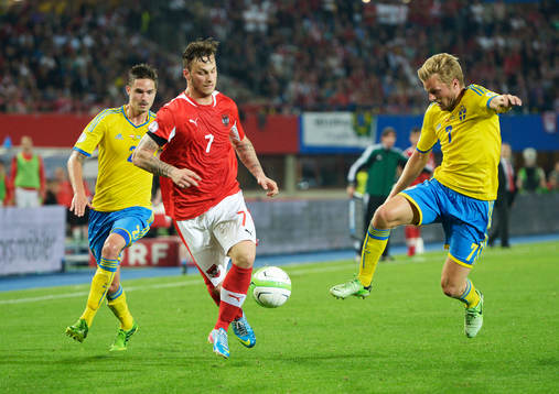 Mikael Lustig och Sebastian Larsson, Sverige och Marko