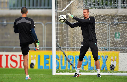 Malmö goalkeepers Robin Olsen, right, practices with