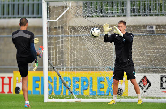 Malmö goalkeepers Johan Dahlin, right, practices with