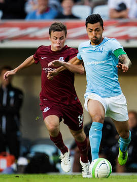 Droghedea United FCs David Cassidy och Malmö FFs Jiloan