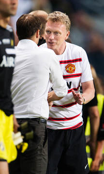 s tränare Andreas Alm och Manchester Uniteds tränare