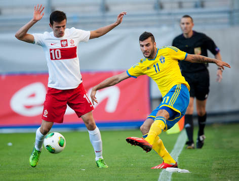 Mikael Ishak, Sverige, och Rafal Wolski, Polen, i