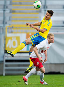 Sveriges Melker Hallberg och Polens Mateusz Lewandovski i