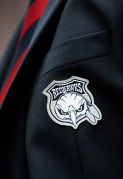 Malmö Redhawks klubbemblem på en kavaj