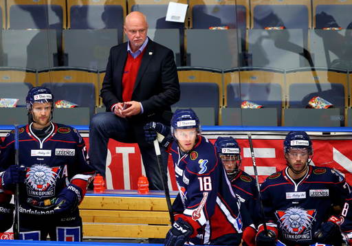 <Linköpings Sebastian Karlsson, tränare Roger Melin,