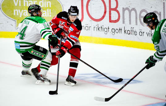 Rögles Jesper Jensen och Malmö Redhawks Robin Alvarez