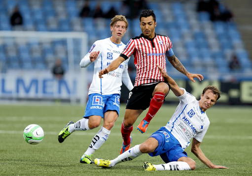 Malmös Jiloan Hamad mellan Norrköpings Alexander Fransson