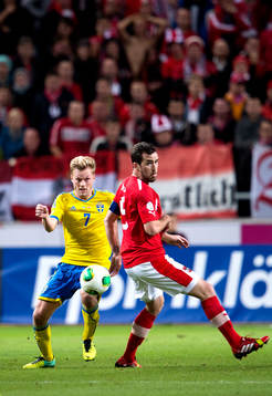 Sveriges Sebastian Larsson och Österrikes Christian Fuchs